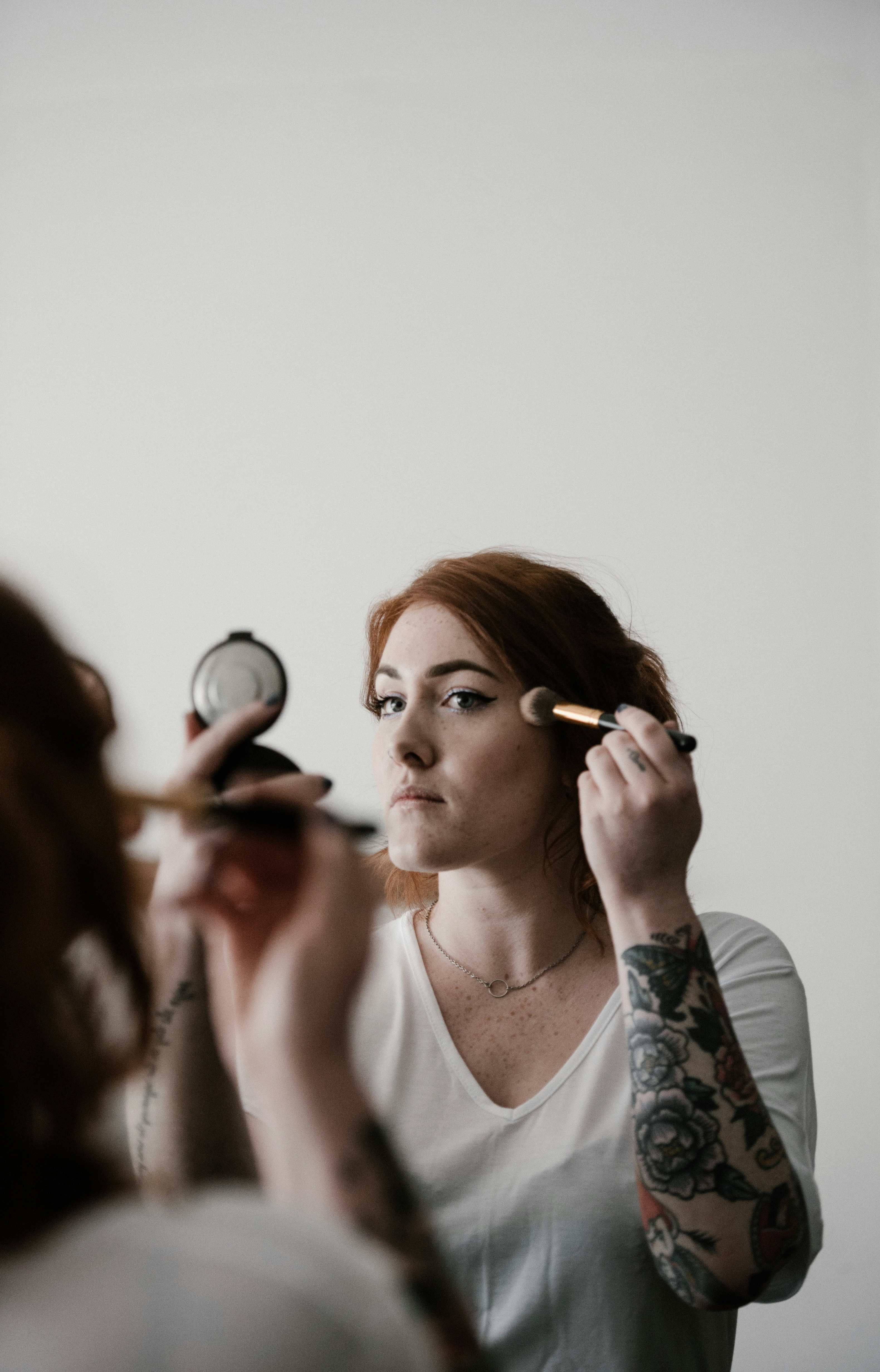 Women applying makeup