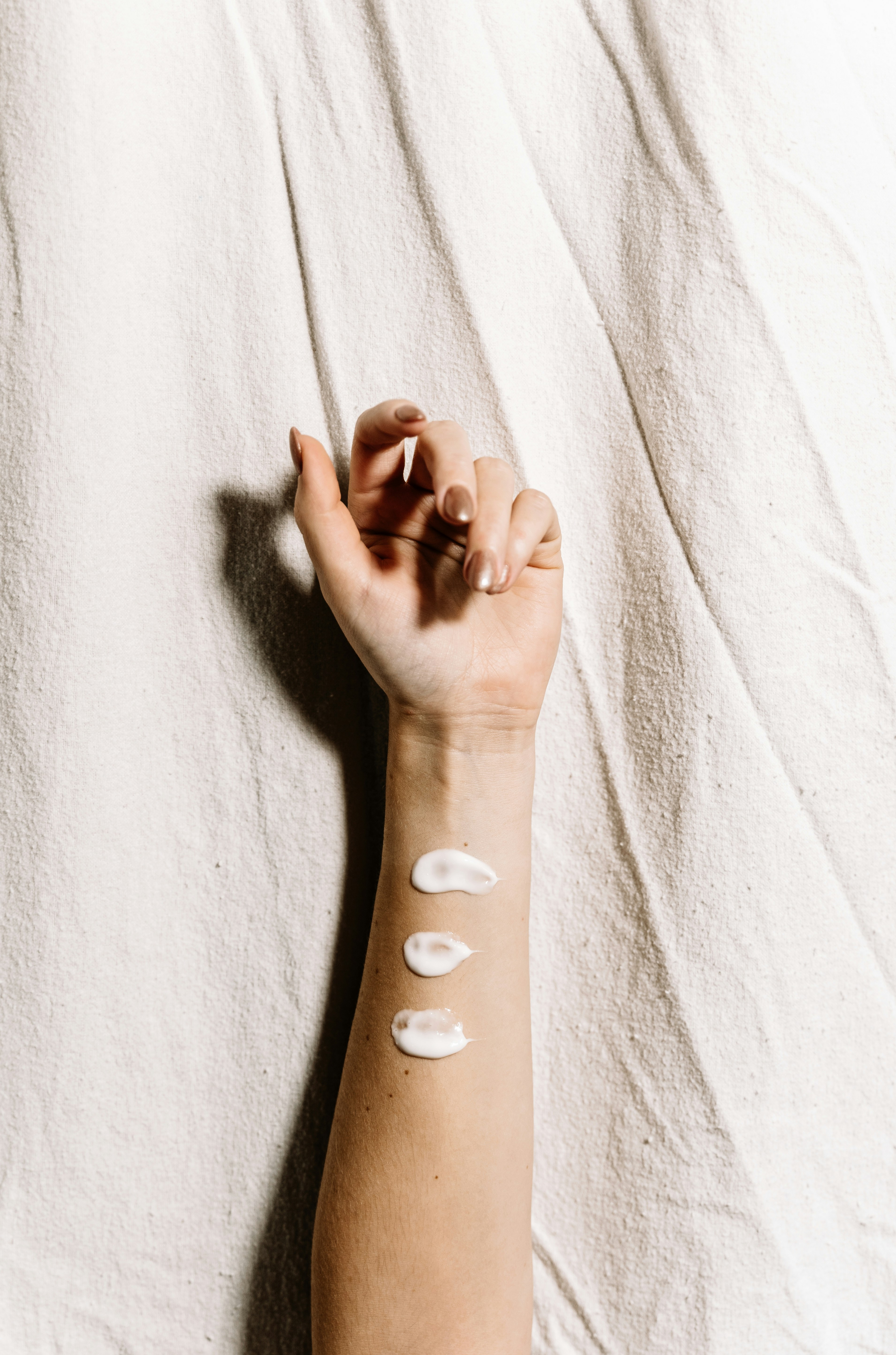 Make-up swabs on arm